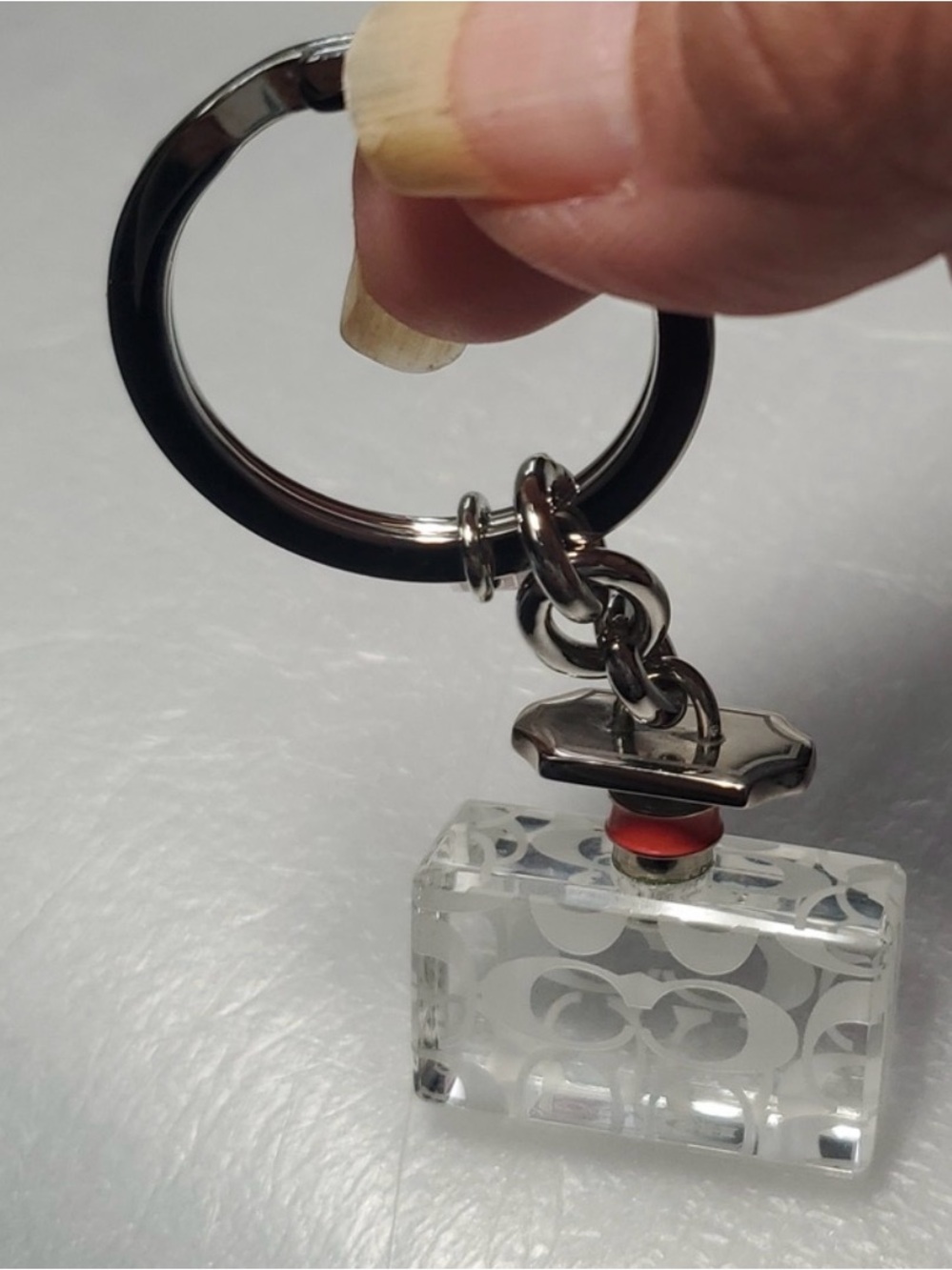 Coach Vintage Clear Acrylic Perfume Bottle Bag Charm Keychain with Coral Accent - Picture 2 of 3